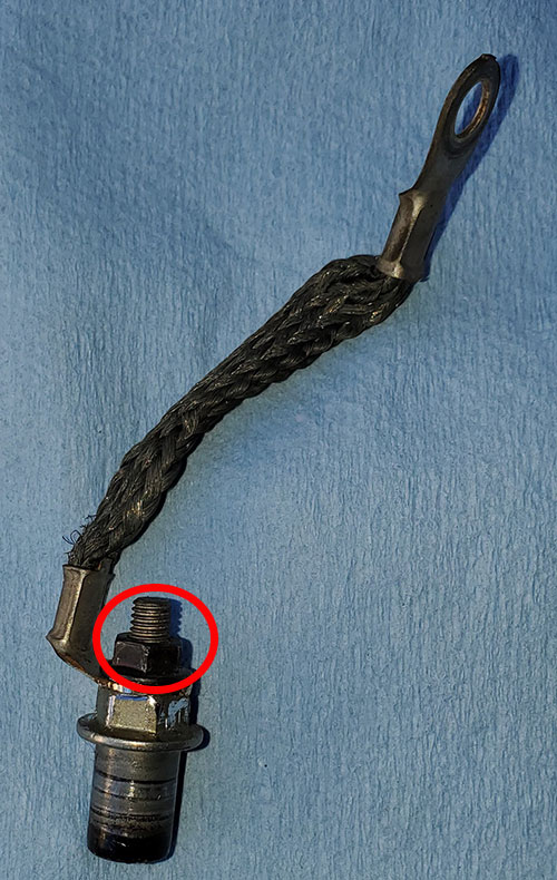 Please help..Stuck ground strap nut on valve cover stud bolt